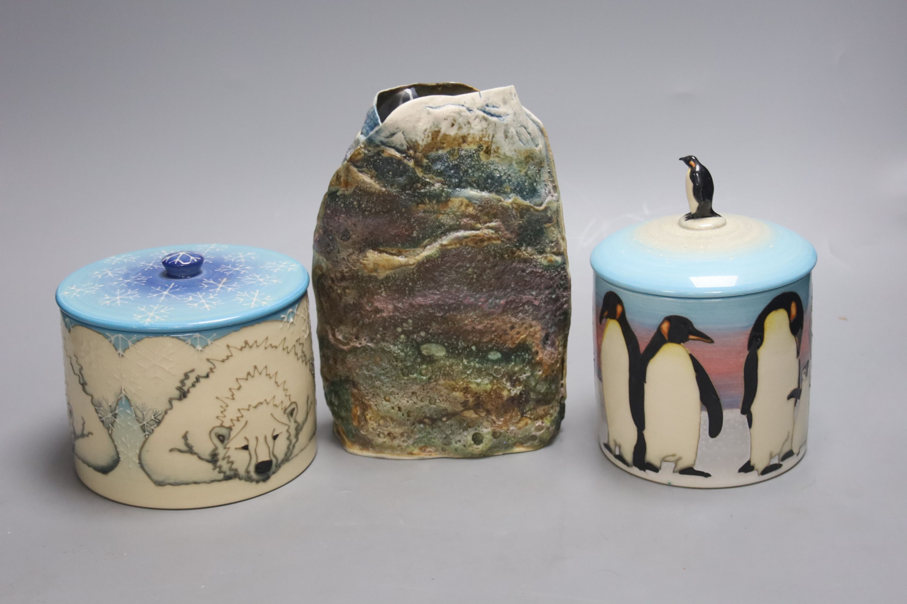 Two Sally Tuffin jars and covers for Dennis China Works, a Kath Bonson pottery vase of a cyclist